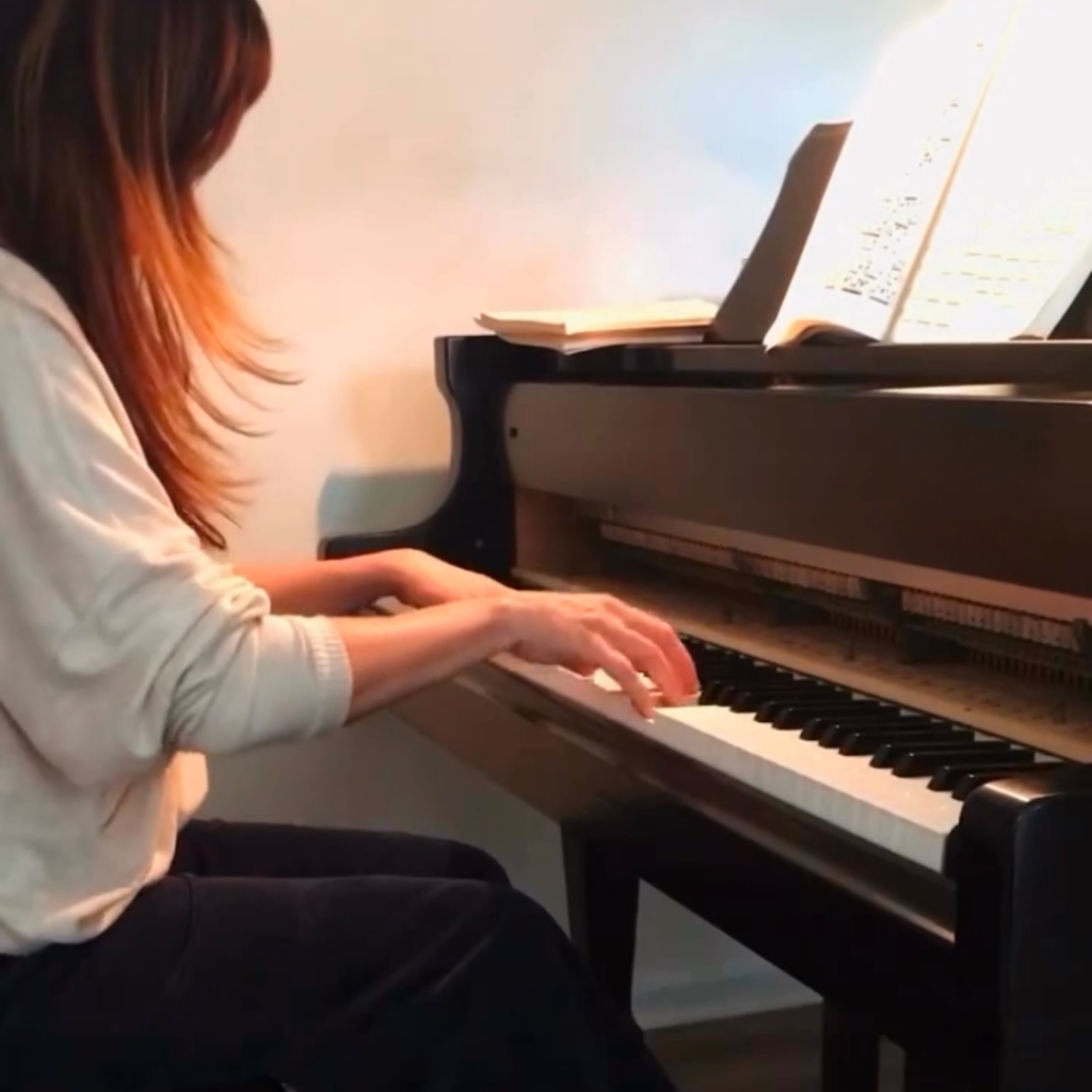 Allison playing the piano